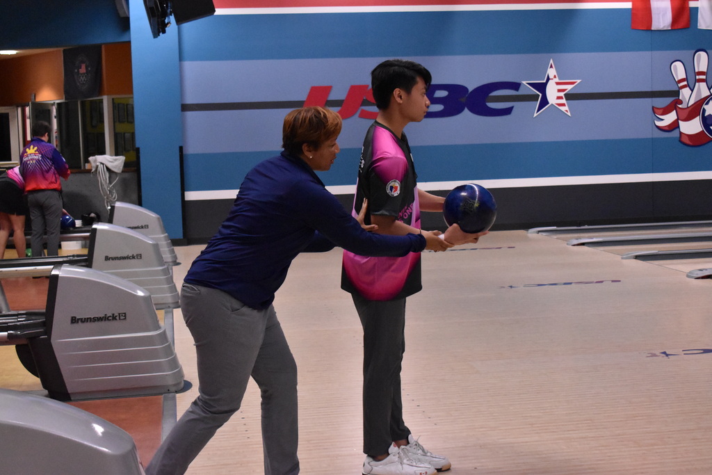 USBC Coach working with a student